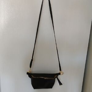 Compact Black Crossbody Bag with Adjustable Strap